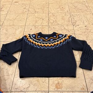 Tory Burch Sport Navy blue sweater, with Orange, Blue and White Patterns.